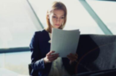 Woman reading paper