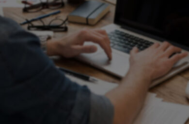 Person typing on laptop